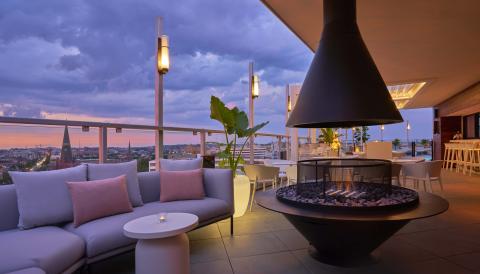 Outdoor meeting area with large fireplace