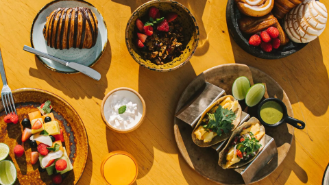 A spread of food including tacos and pastries at Viceroy Los Cabos