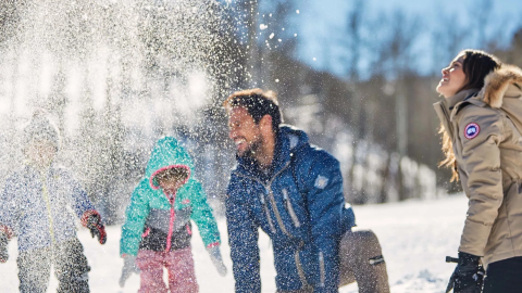 A family playing in the snow at Viceroy Serbia