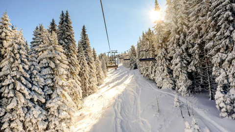 A ski lift in the middle of the forest in Viceroy Serbia