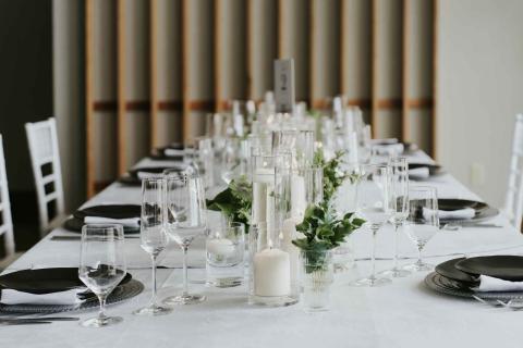 A banquet table set up for a wedding.