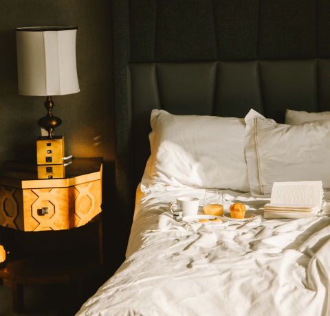 Breakfast on a bed in a room at Viceroy Washington DC
