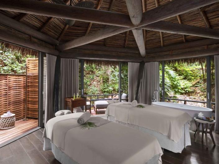 Two massage tables in an a spa hut at Viceroy Sugar Beach
