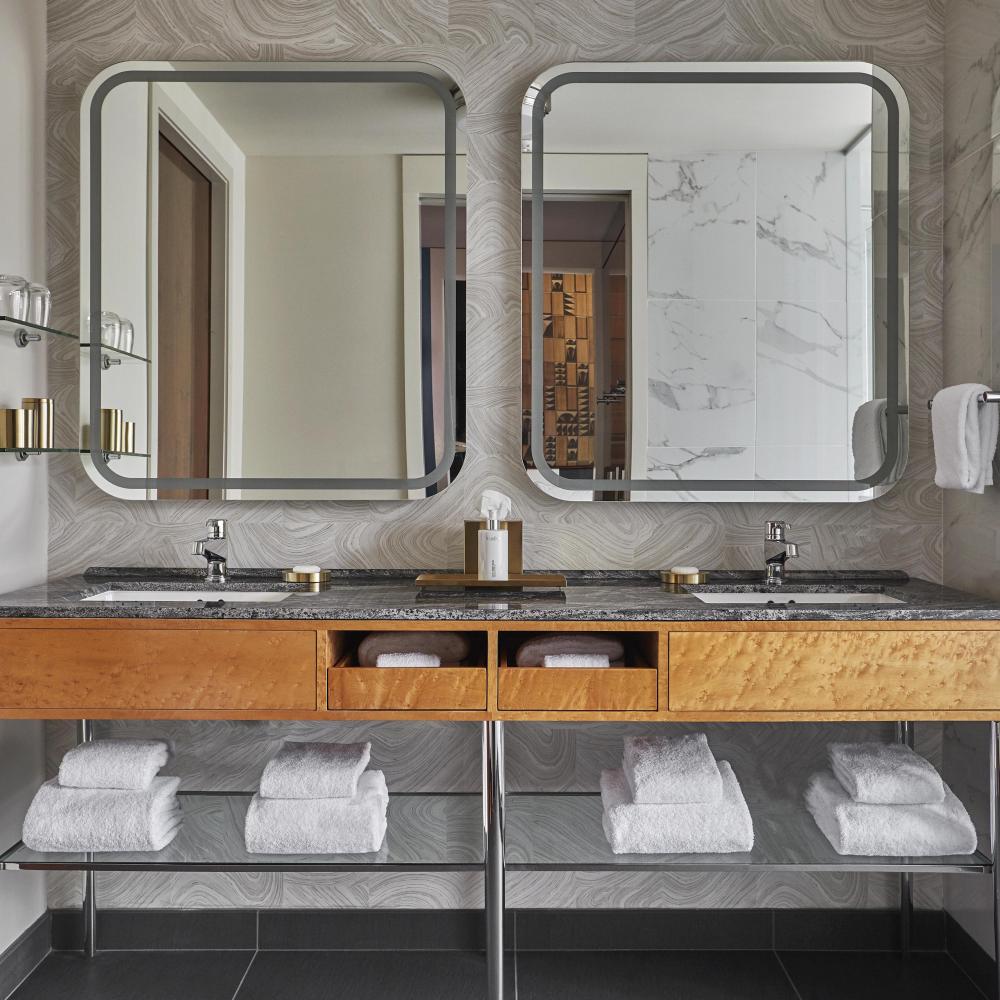 Bathroom vanity with two sinks and two mirrors