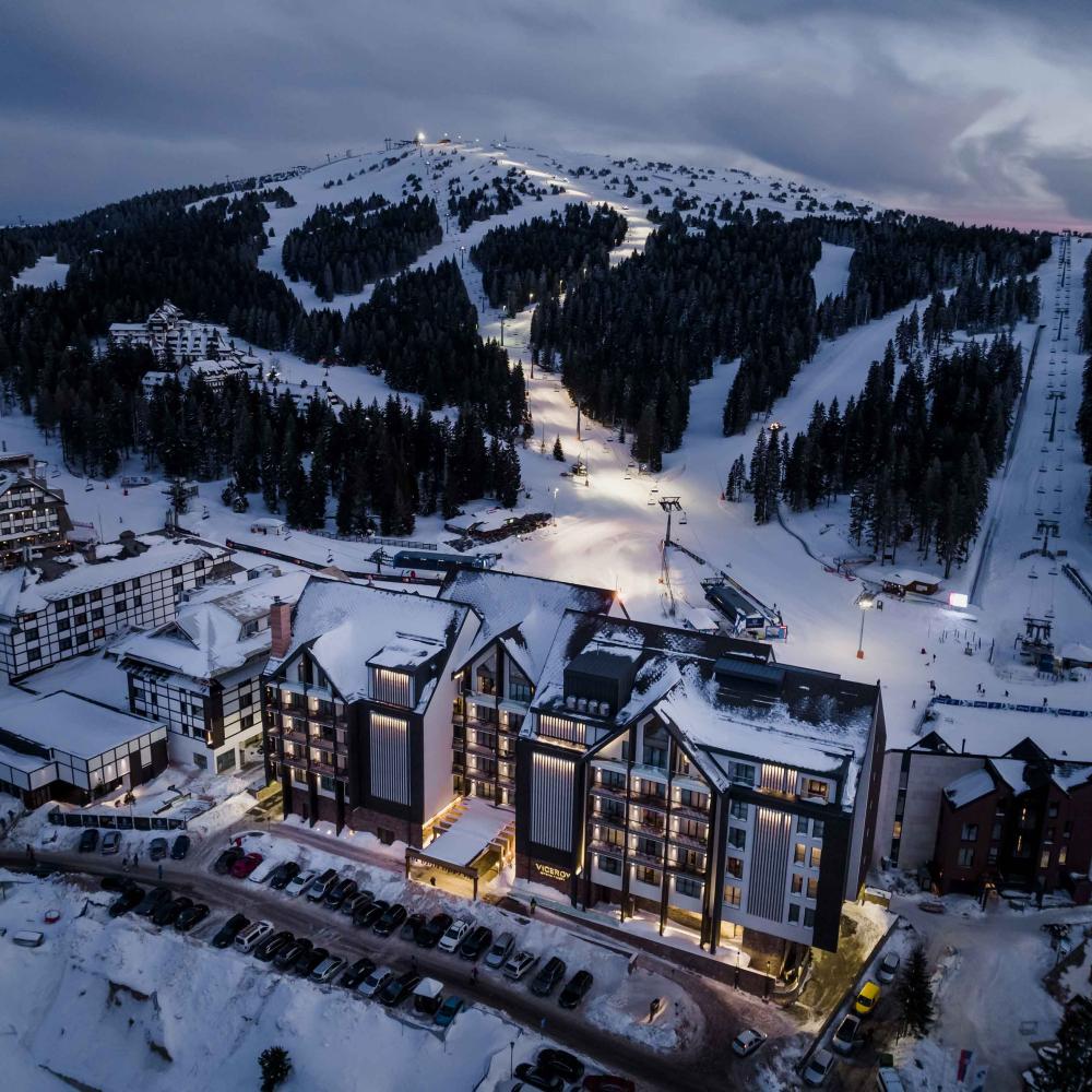An aerial view of Viceroy Kopaonik Serbia, with the ski slope behind it
