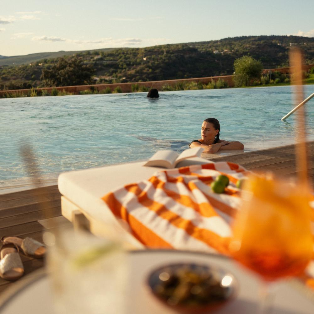 A few people hanging in the pool at Ombria Algarve