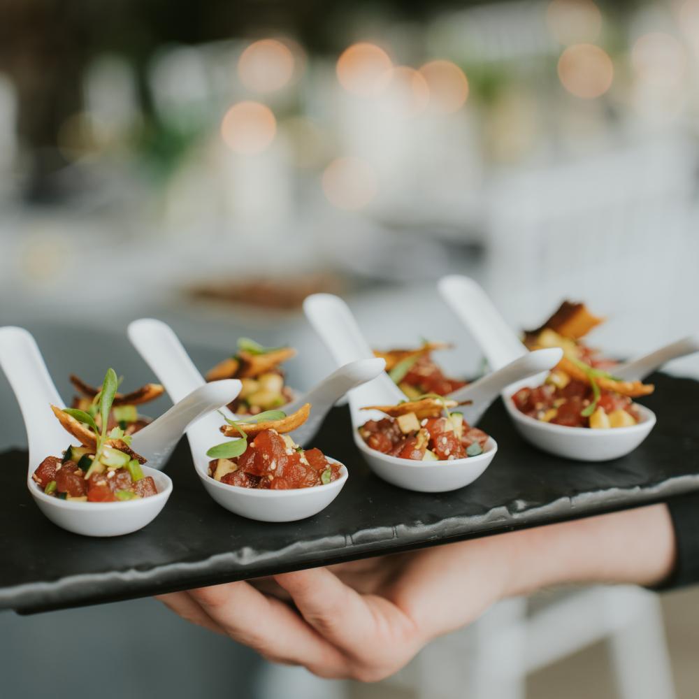 Gourmet food served on a black tray
