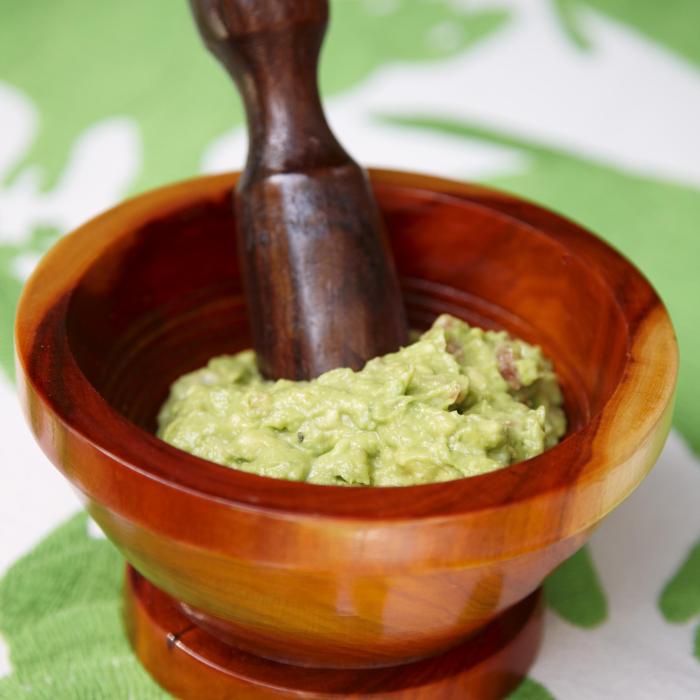 wooden bowl of guacamole