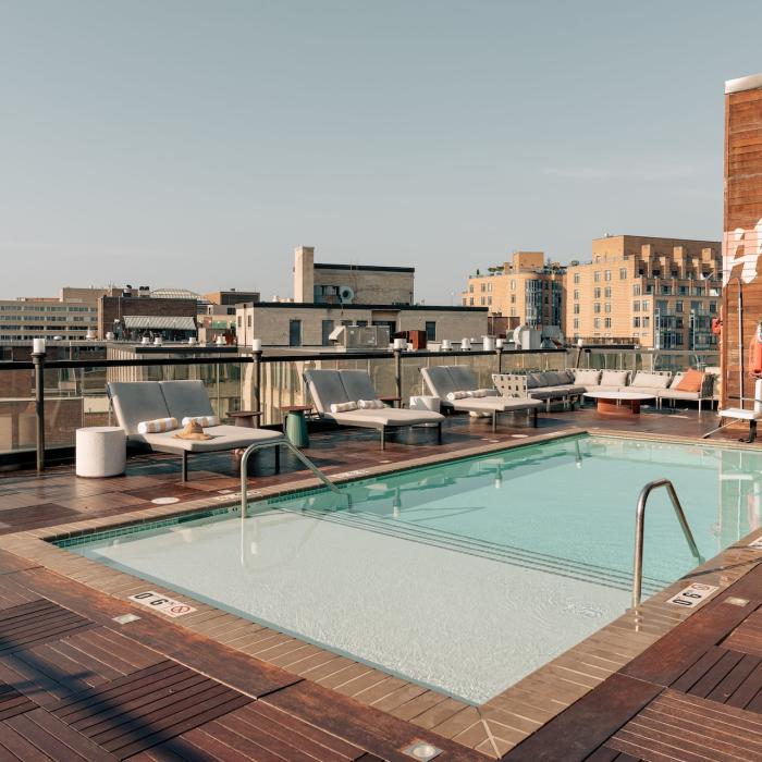 A wide view of the pool deck at Hush, the rooftop patio bar at Viceroy Washington DC