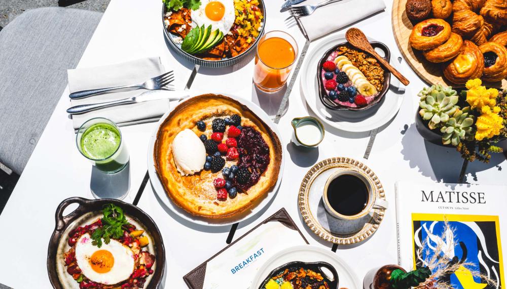 A spread of food offered by Viceroy Santa Monica