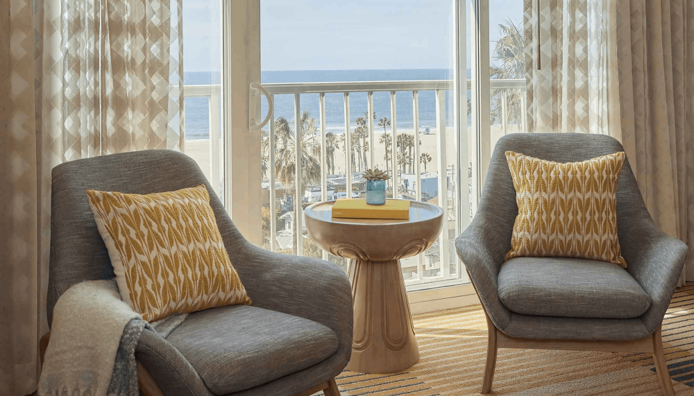 2 Chairs in a room by the balcony in a room at Viceroy Santa Monica
