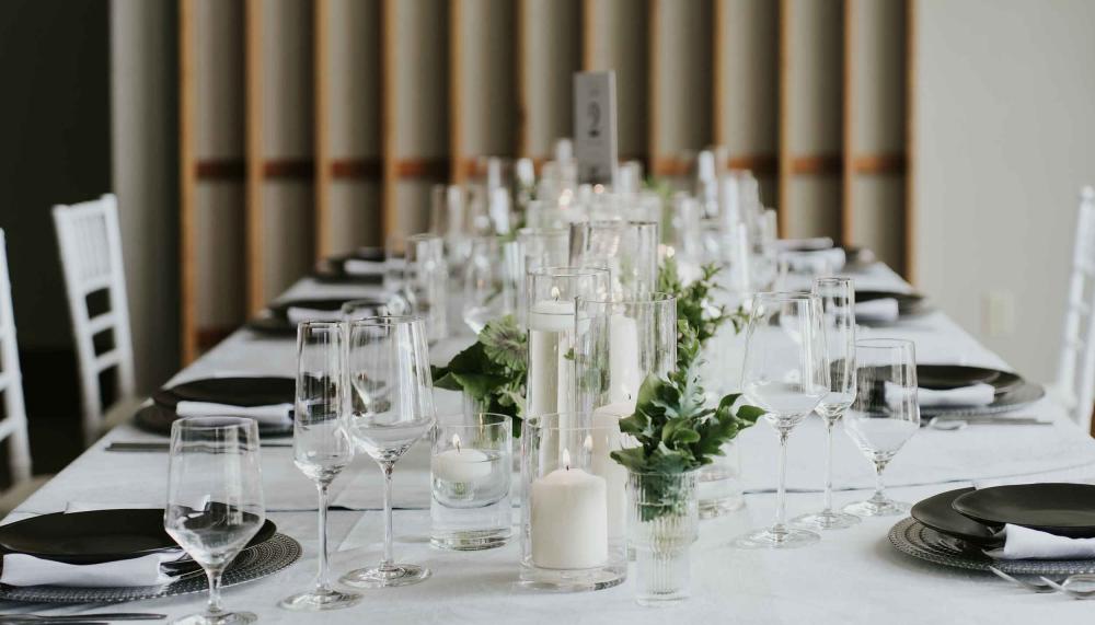 A banquet table set up for a wedding.