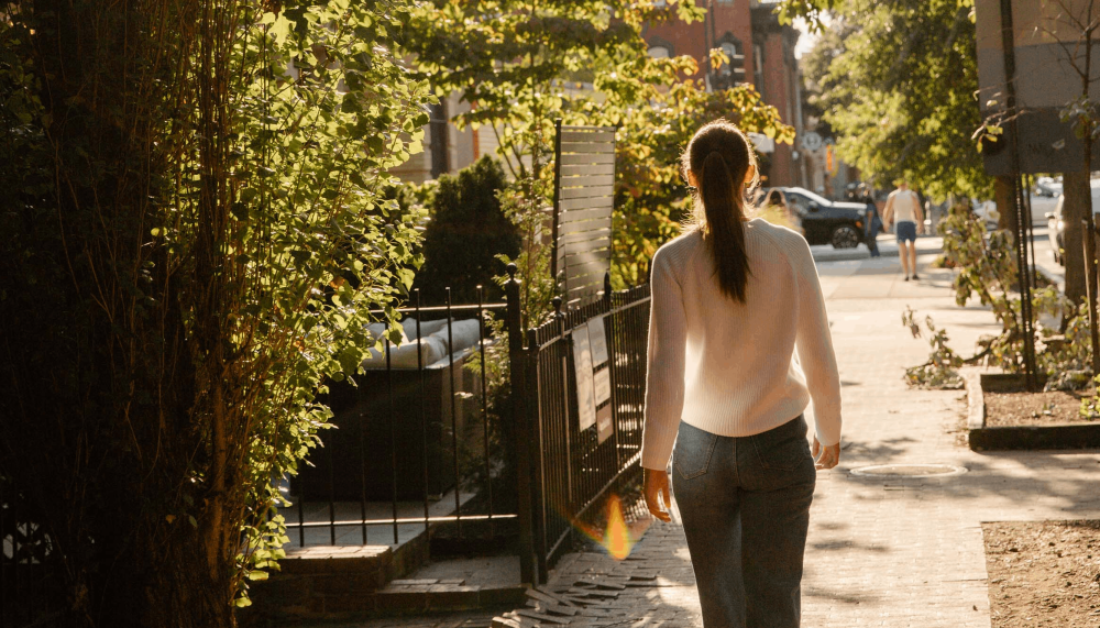 A woman walking down the street in Washington DC