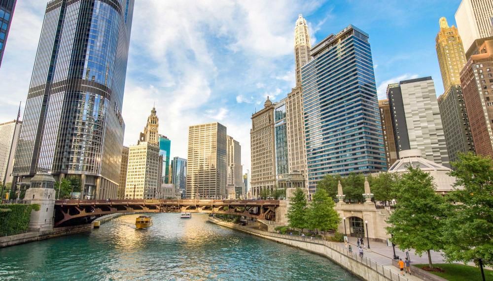 view of Chicago river and surrounding buildings in downtown area 