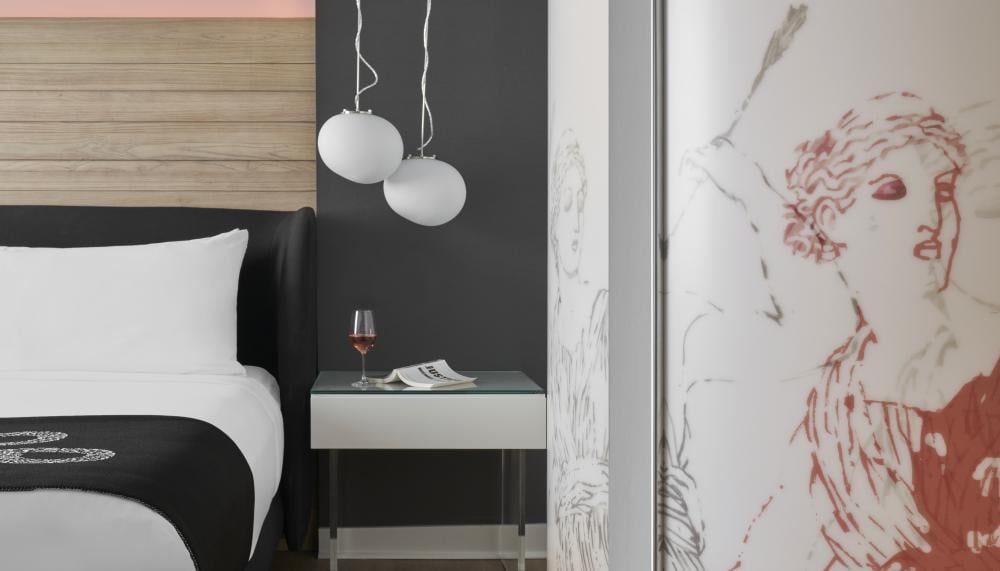 King Suite with illustrations on the shower panel