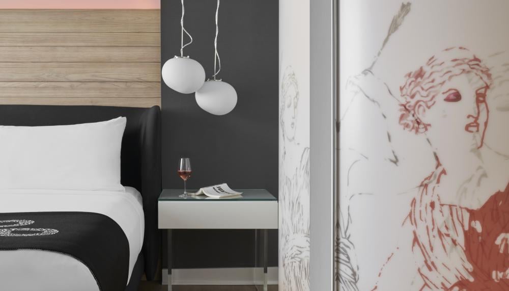 King Suite with illustrations on the shower panel