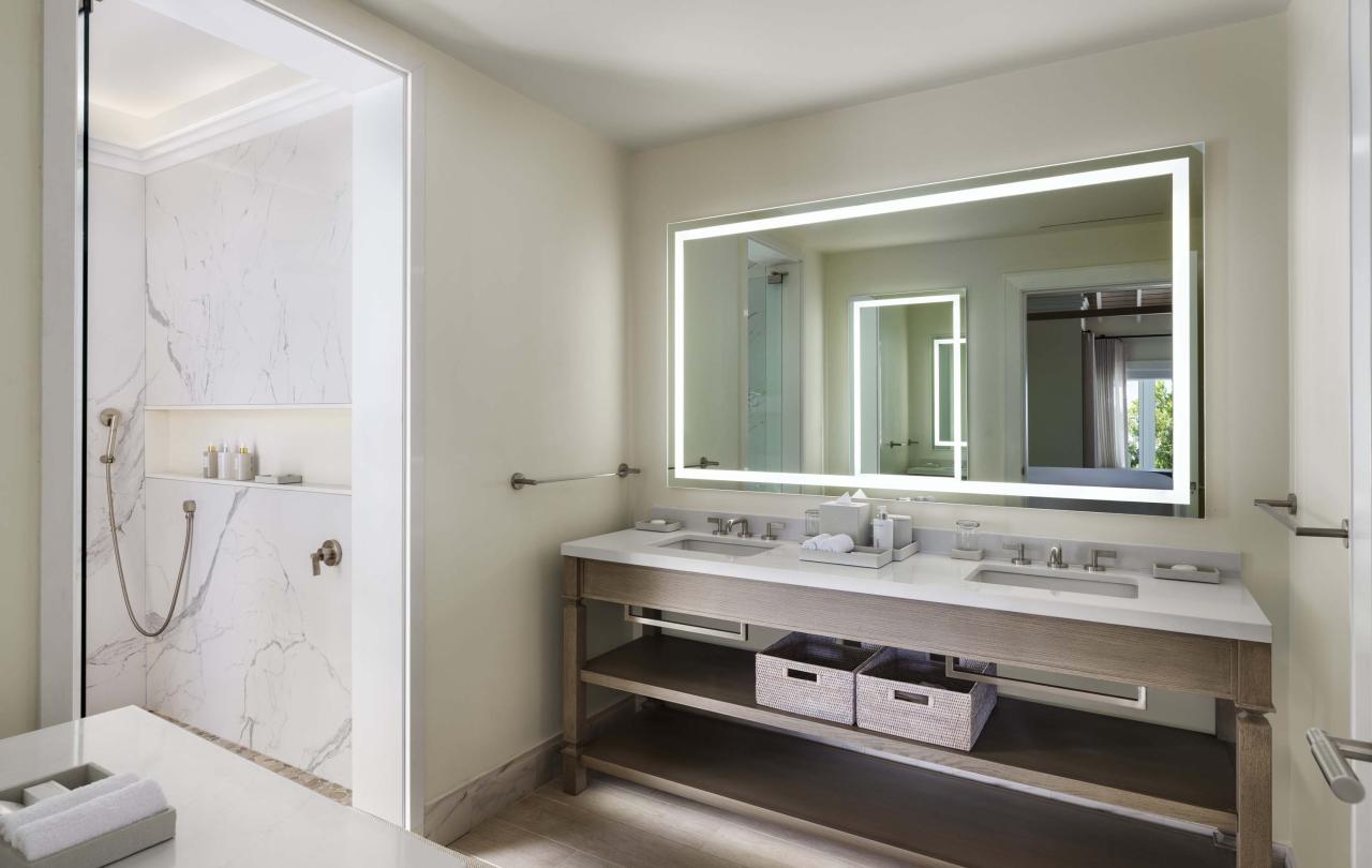 Bathroom with a double vanity and stand up shower