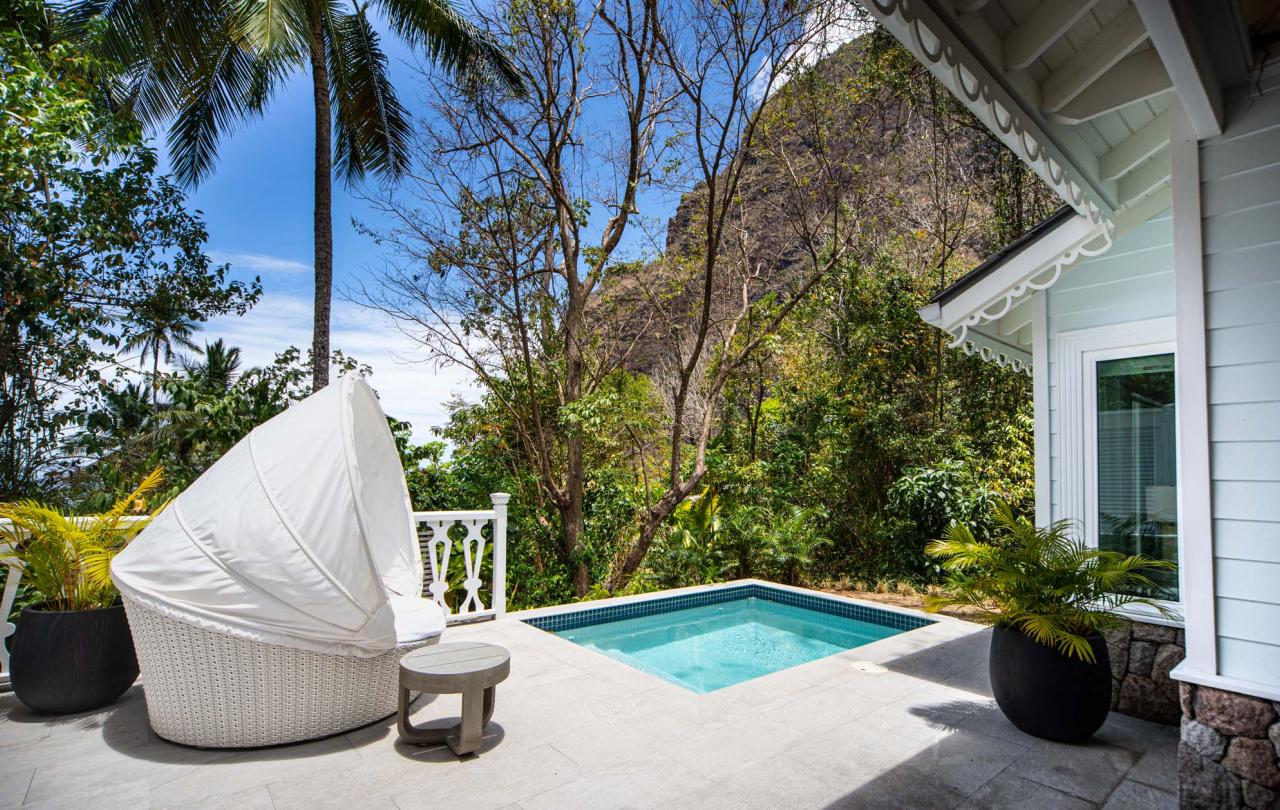 Lounge chair next to a hottub