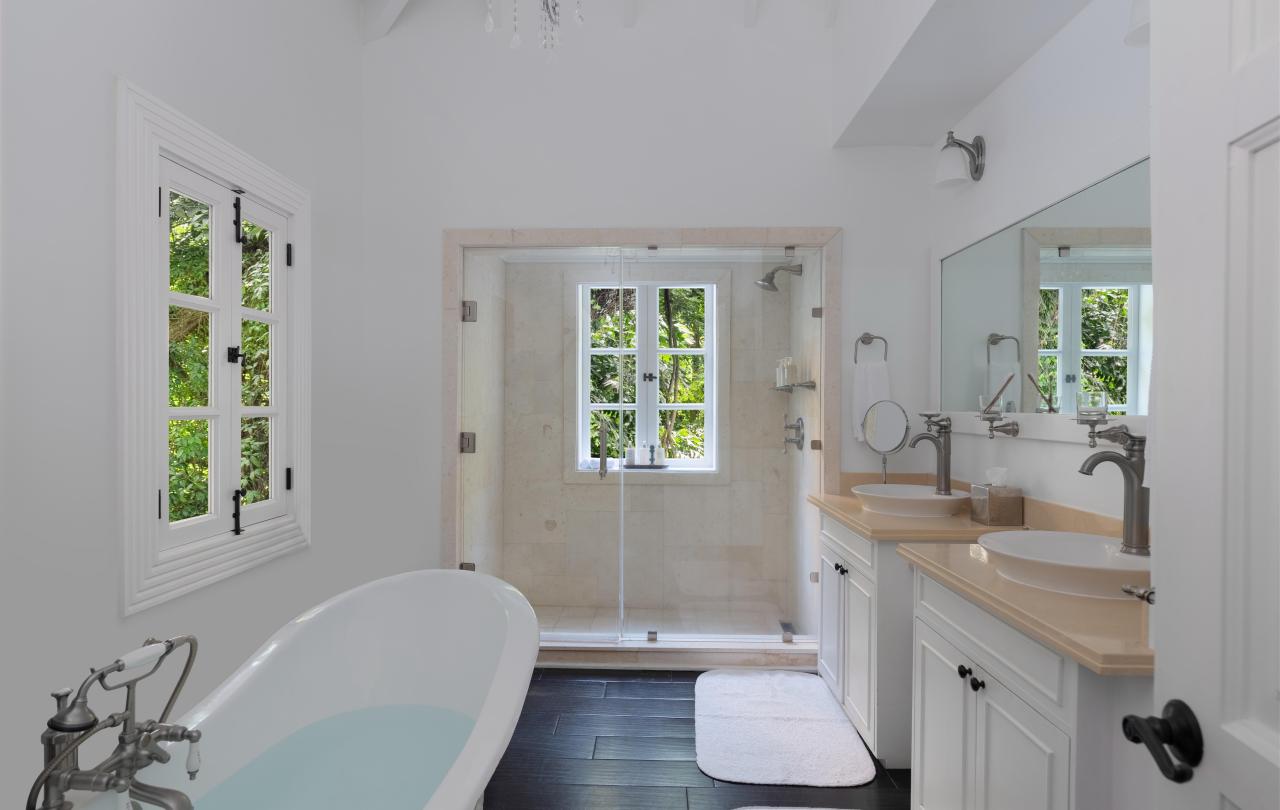 bathroom with claw tub and shower