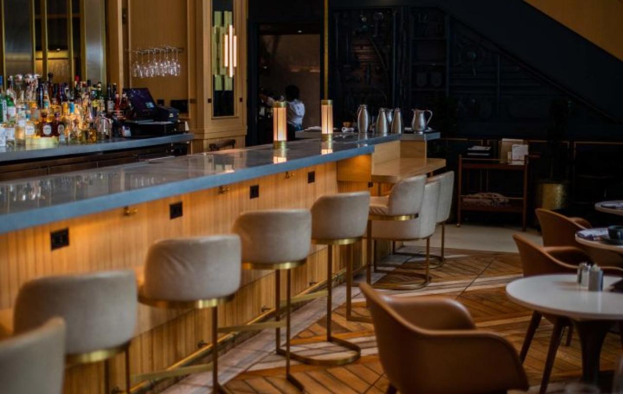 A row of stools along the bar at Somerset, Viceroy Chicago