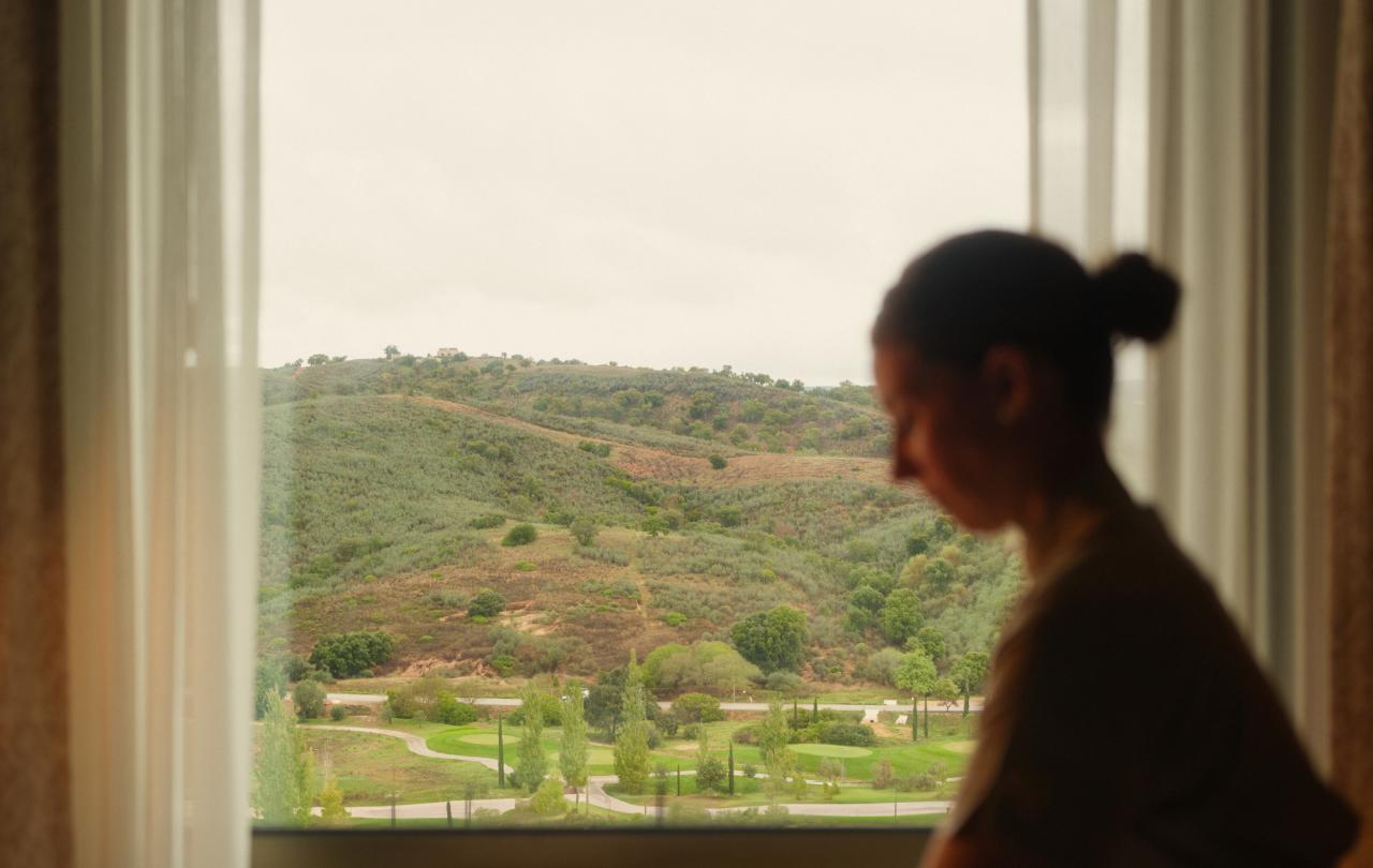 A woman massaging a person at the spa at Ombria Algarve