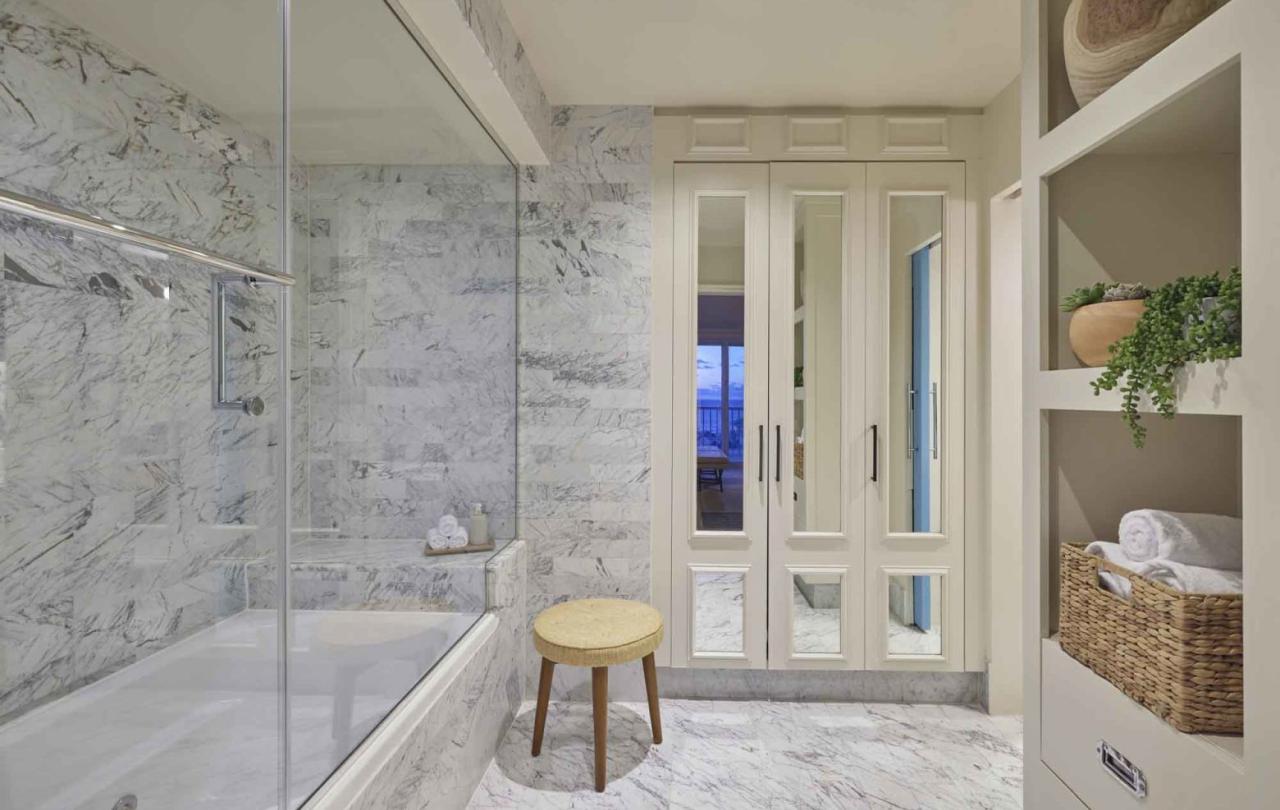 Bathroom interior with marble walls and fresh linen nook