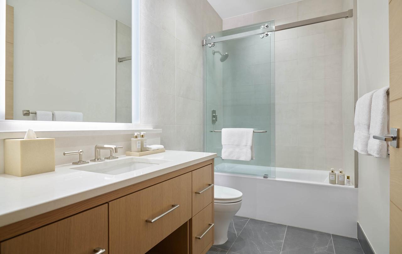 interior of bathroom with glass door shower