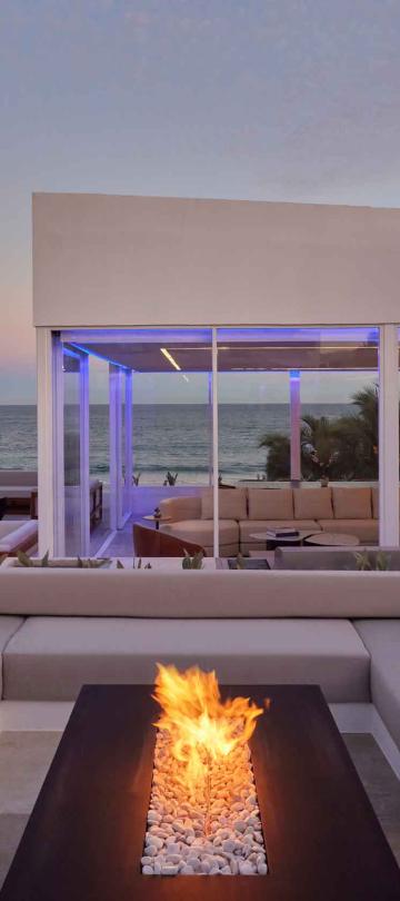 los cabos outdoor seating area dn fireplace