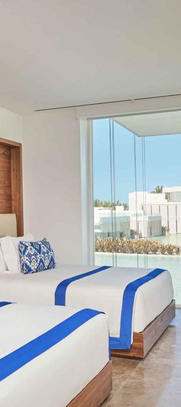 los cabos secondary bedroom with two double beds