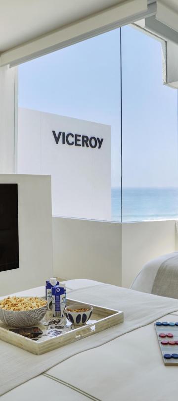 bedroom with TV in two bedroom suite
