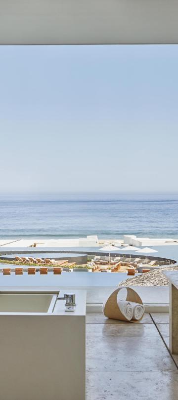 view of interior seating area with window to exterior pool view