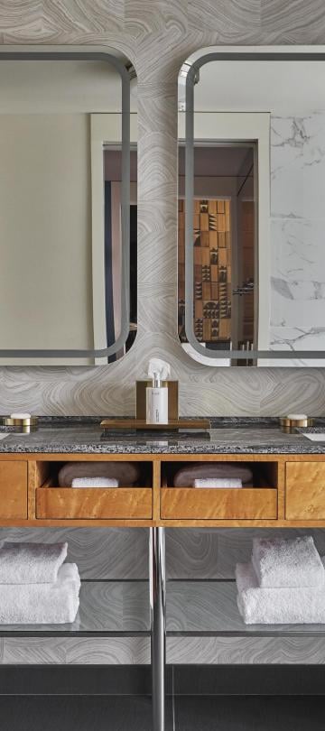 Bathroom vanity with two sinks and two mirrors