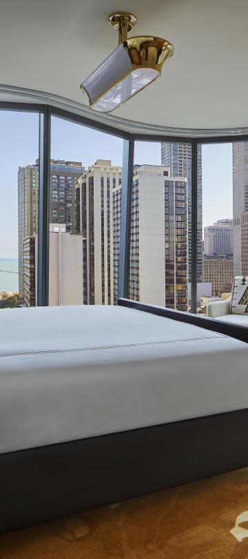 Bedroom with floor to ceiling windows
