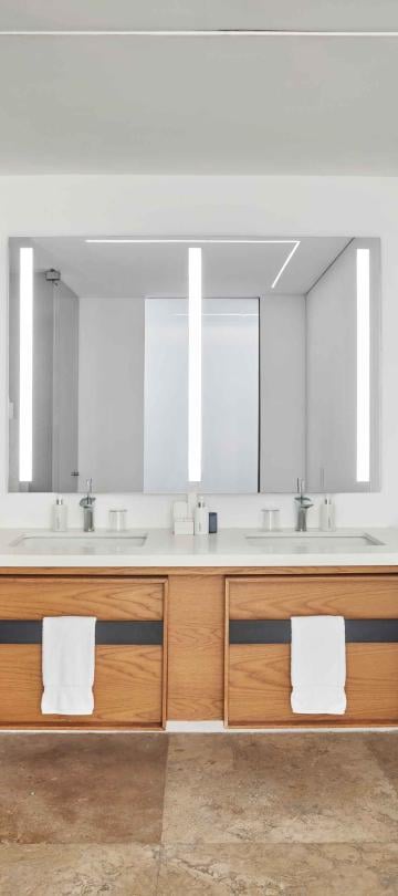 los cabos partial ocean view double sink in bathroom
