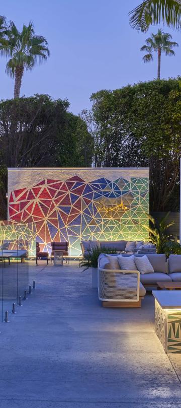 Outdoor meeting area with cabanas. and various seating options
