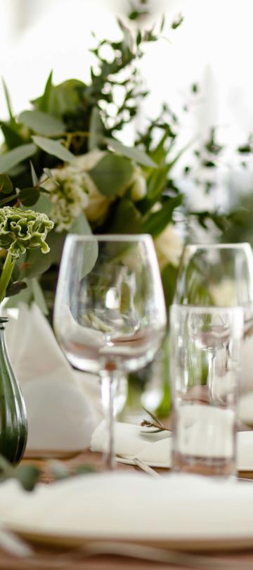 dinner table set for wedding reception