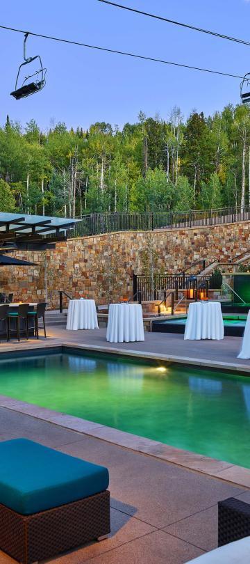 Pool and bar area at Viceroy Snowmass set up for an event