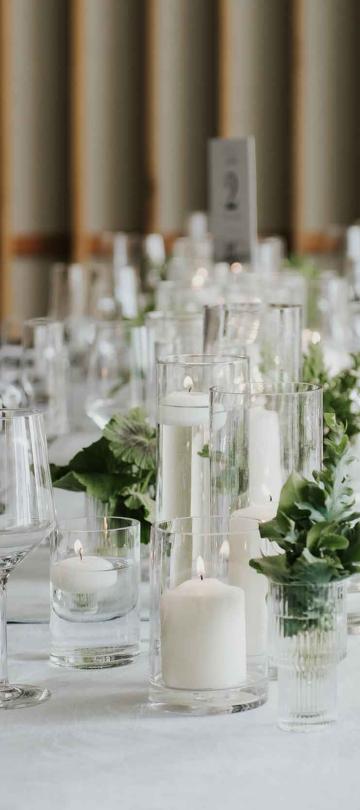 Indoor venue set with long table for reception
