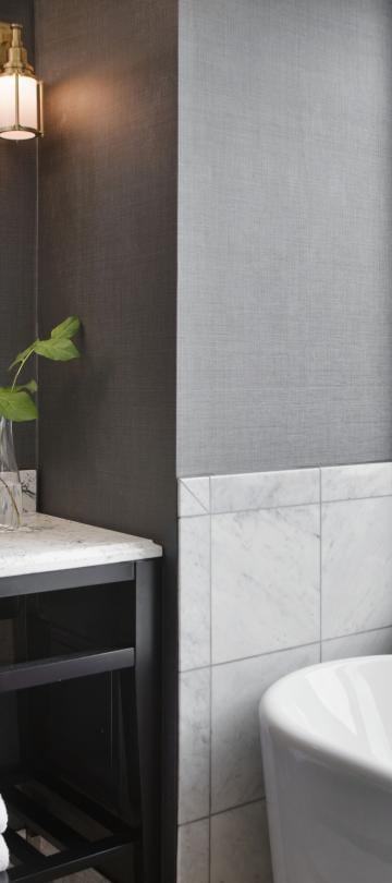 Bathroom with tub and vanity
