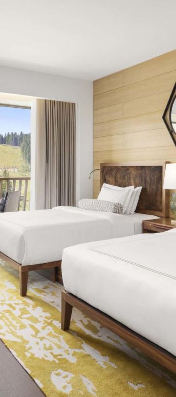 Two queen beds in a room at Viceroy Kopaonik Serbia