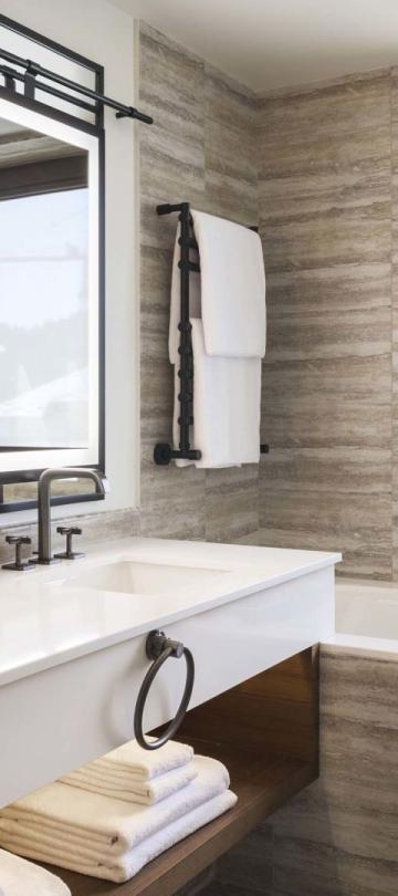 A double vanity with a soaker tub in a suite at Viceroy Kopaonik Serbia
