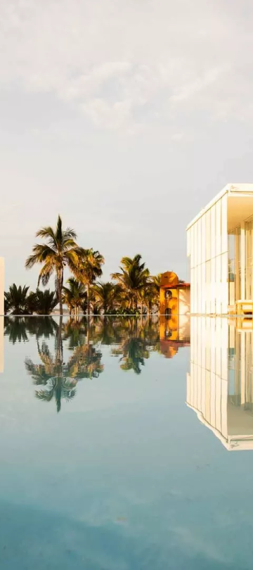 A pool surrounding part of the exterior of Viceroy Los Cabos