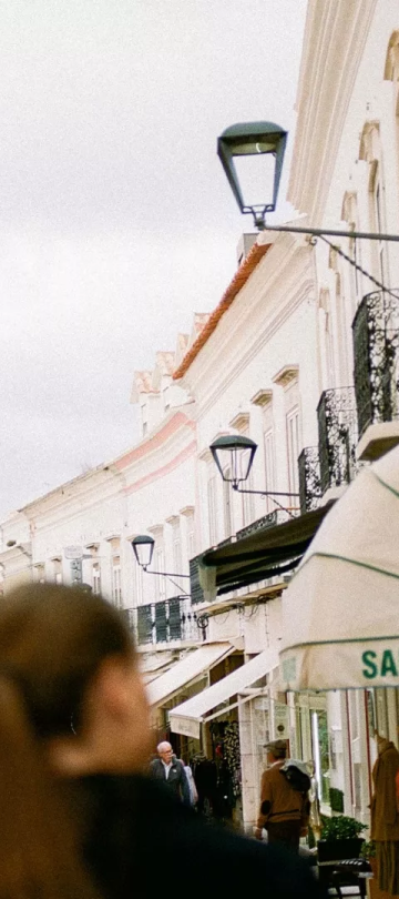 People walking down a street near Viceroy Ombria Algarve