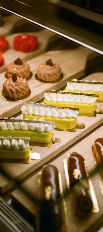 An assortment of pastries in a display case at Cafe Central