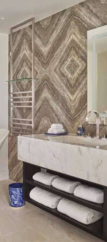 A large bathroom with double sink and deep tub in a two bedroom residence at Viceroy Ombria Algarve