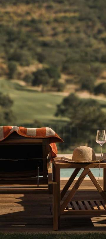 Two outdoor lounge chairs overlooking the valley at a two bedroom residence at Viceroy Ombria Algarve