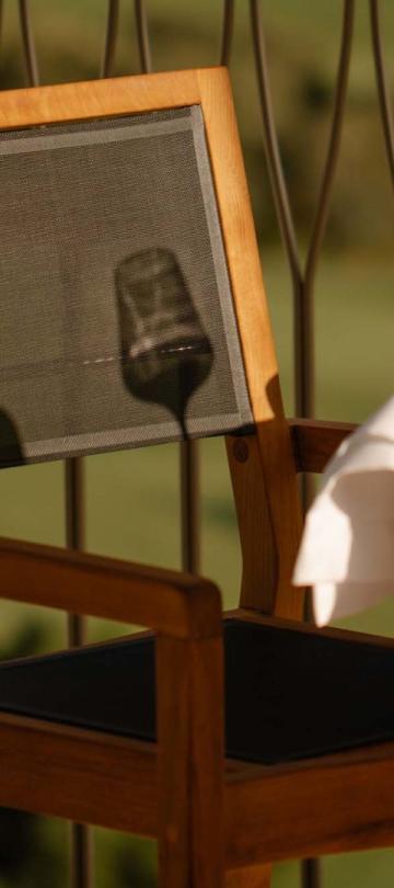 A warm outdoor dining table at a two bedroom residence at Viceroy Ombria Algarve