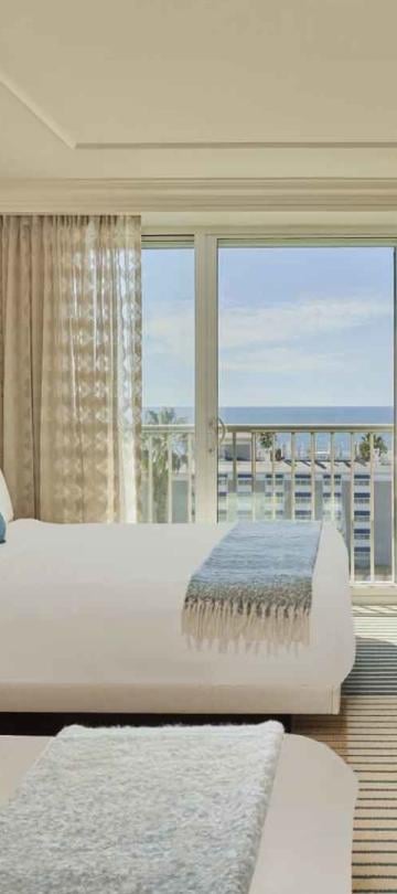 Two queen beds in a room at Viceroy Santa Monica