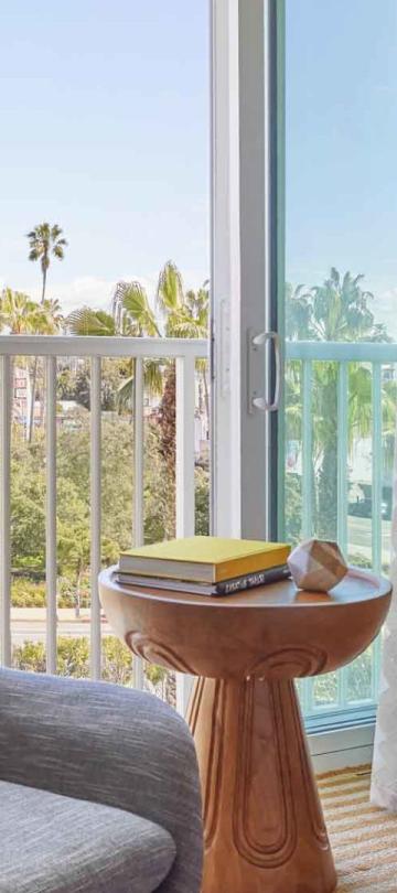 Two chairs in a city view king room at Viceroy Santa Monica