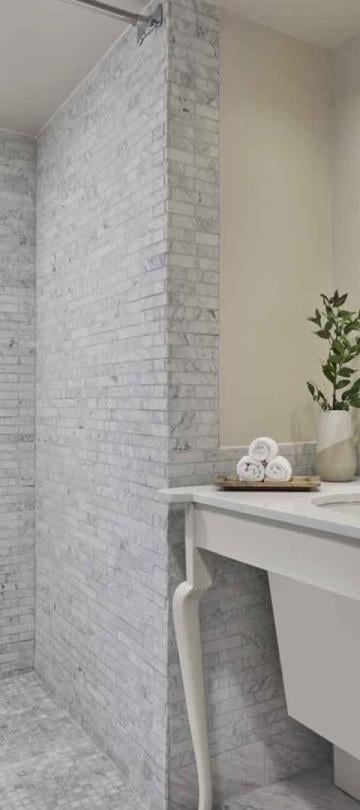 A shower and vanity in a room at Viceroy Santa Monica